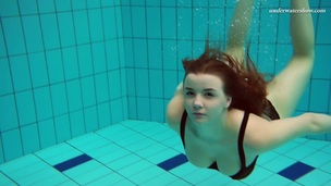 Gorgeous Vesta stripping underwater in arousing solo video