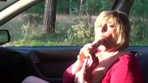 Excellent short haired aged golden-haired wench was blowing cock in the car