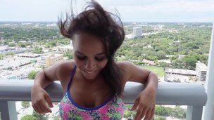 Latin chick is charmed by his high rise condo and copulates his brains out