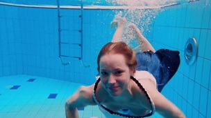 Legal age teenager hotty Avenna is swimming in the pool