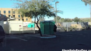 Teen swallows strangers cum in porta potty gloryhole in public parking lot