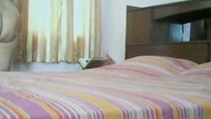 Hidden webcam in a hotel room captures BBW Indian aunty tempted for obscene sex