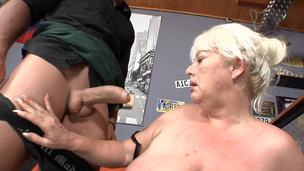 A bulky granny is getting drilled hard in the bar in this video